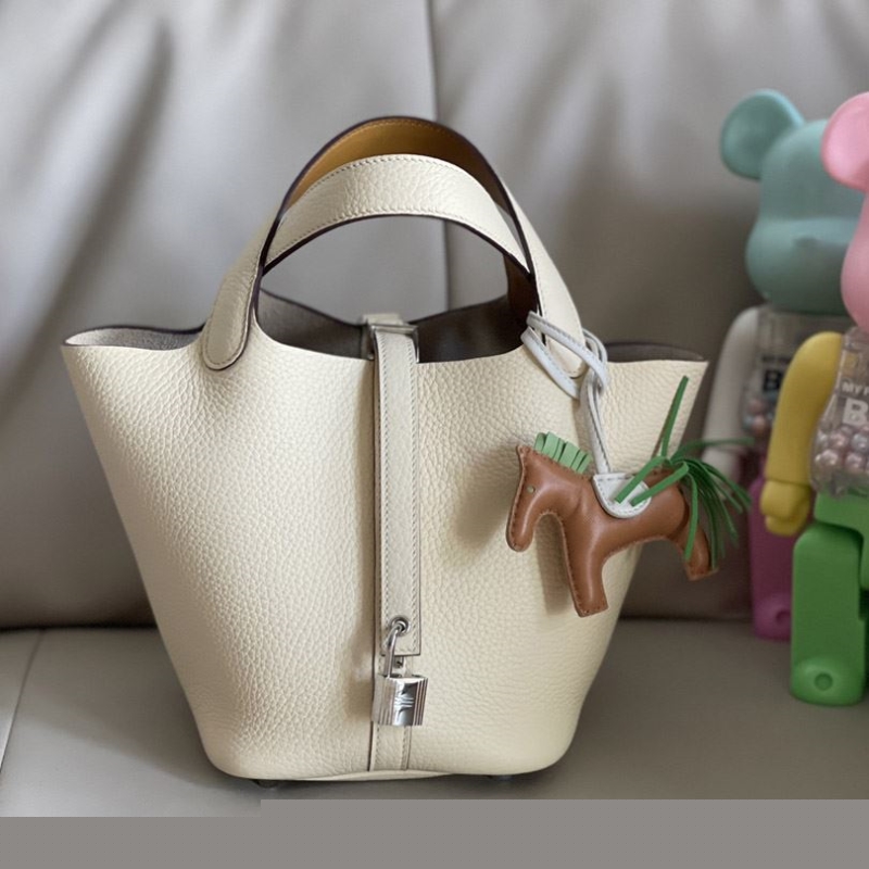 H**mes shopping bags